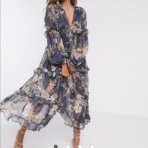 Pleated layered tiered midi dress in navy floral print with lace trim